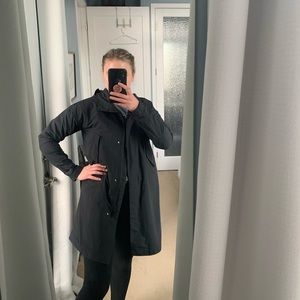Black Everlane rain jacket